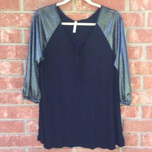 Black blouse with silver sleeves, tie front